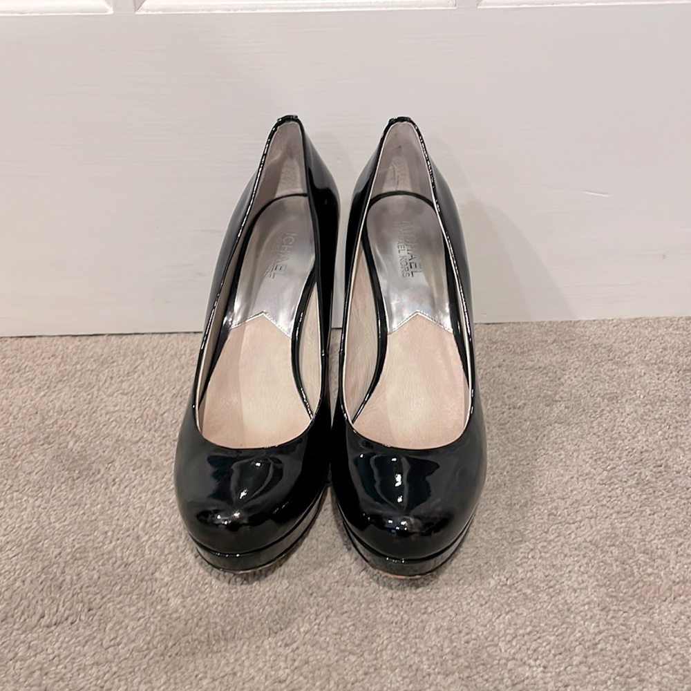 Michael Kors black pumps.             Size 9 1/2 M.
